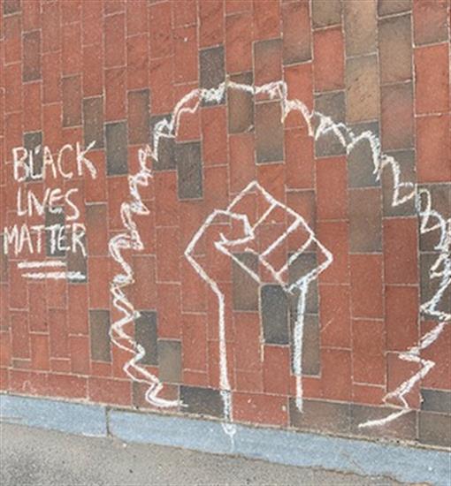 A chalk drawing with the words 